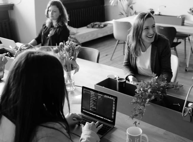 Three females at an office